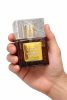Humrah Dkhoun eau de parfum bottle in hand