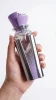Arya – реален размер Arya eau de parfum 100 ml, показан в ръка за реална представа за размера и изчистения дизайн на бутилката