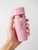 Lara Extrait Eau de Parfum 100 ml държан в ръка за реална представа за размера на флакона