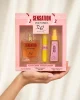 Aroma Ray Sensation For Women Комплект 3 части 50+15+50 ml, държан естествено в дамска ръка за представяне на реалния размер на кутията