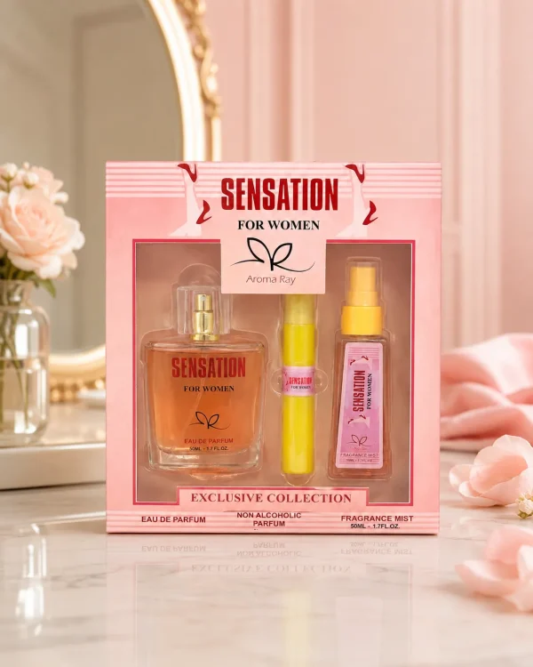 Aroma Ray Sensation For Women Комплект 3 части 50+15+50 ml в елегантна розова lifestyle сцена с цветя, огледало и подаръчно представяне