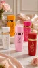 Lara Extrait + Lara Rouge + Lara White + Lara Tous + Lara Candy Eau de Parfum 5 x 100 ml в луксозна lifestyle сцена