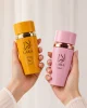 Lara Tous + Extrait в ръка Lara Tous + Lara Extrait Eau de Parfum 2 x 100 ml в ръка